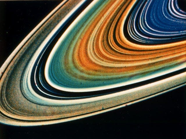 Saturn's rings are shown in false color in a picture taken by a Voyager probe in 1981.