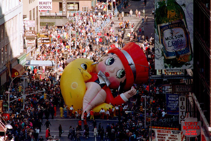 Betty Boop collapses on Broadway near 49th Street as handlers work to raise the deflated helium balloon during the Macy’s Thanksgiving Day Parade in New York City, Nov. 27, 1986. Betty Boop, the last balloon in the parade, could not finish the parade. (Photo: Ron Frehm/AP)