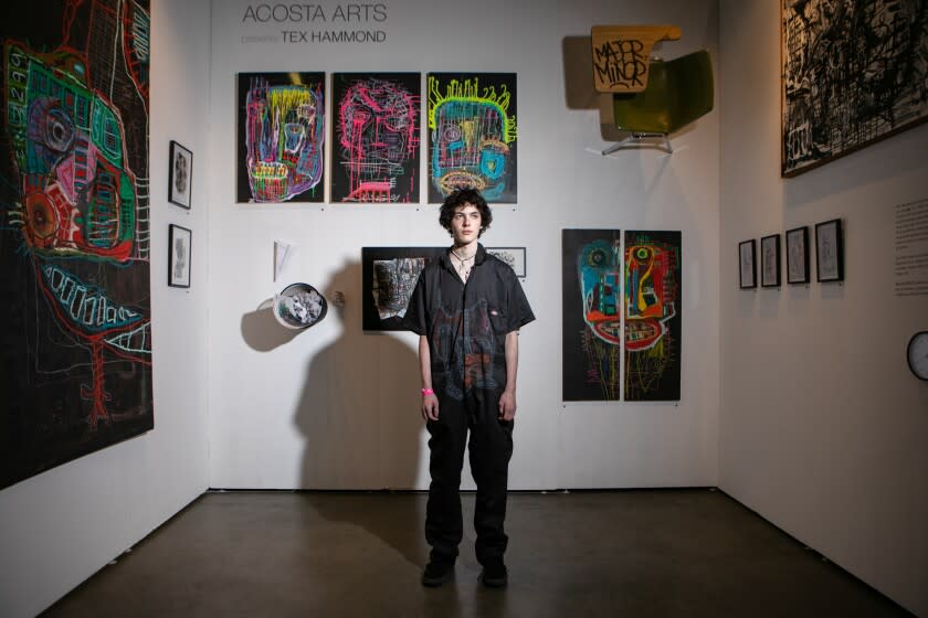 14-year-old artist, Tex Hammond poses for a portrait