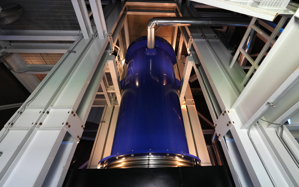 A cross-section of a prototype reactor is shown inside Last Energy's microreactor demonstration unit Tuesday, Jan. 17, 2023, in Brookshire, Texas. For the company's CEO, Bret Kugelmass, the urgency of the climate crisis means zero-carbon nuclear energy must be scaled up soon. (AP Photo/David J. Phillip)