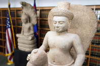 Some of the Cambodian antiquities recovered by the United States Attorney's Office are displayed during a news conference in New York, Monday, Aug. 8, 2022. Officials were announcing the repatriation of 30 antiquities to Cambodia that had been illegally trafficked. (AP Photo/Seth Wenig)