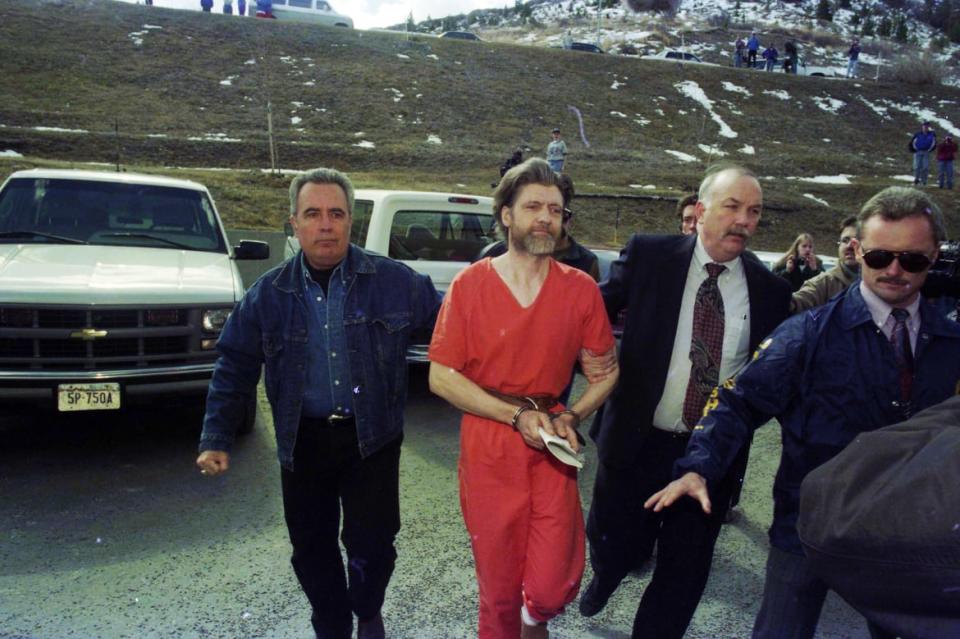 <div class="inline-image__caption"><p>Kaczynski s guided to his arraignment in Helena, Montana on April 4, 1996.</p></div> <div class="inline-image__credit">Michael Macor/Getty</div>