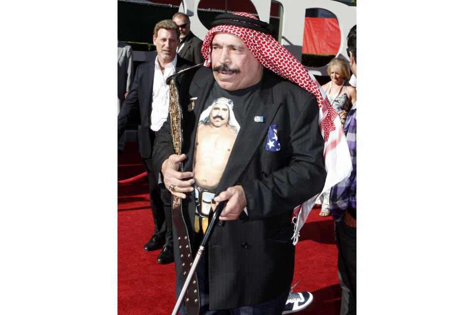 FILE - The Iron Sheik arrives at the ESPY Awards in Los Angeles on July 15, 2009. The Iron Sheik, born Hossein Khosrow Ali Vaziri, died Wednesday, June 7, 2023, at age 81. (AP Photo/Matt Sayles, File)