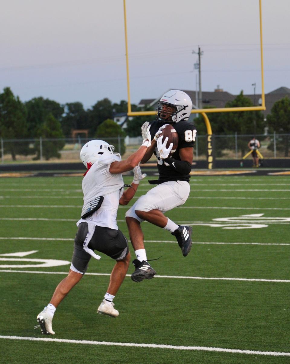 Clyde's Garis Gray catches a pass in a scrimmage against Hawley on Friday.