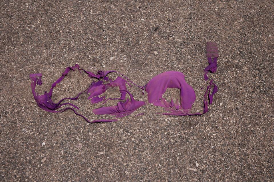 This July 15, 2019 photo shows a bra left on the beach where Ethiopian migrants are gathered by smugglers for evening boat trips to Yemen from Obock, Djibouti. (AP Photo/Nariman El-Mofty)