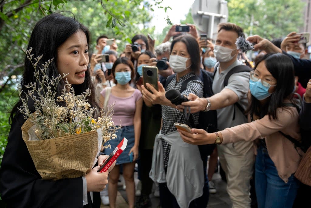 Zhou Xiaoxuan, a former intern at China’s state broadcaster CCTV, speaks outside a courthouse (AP)