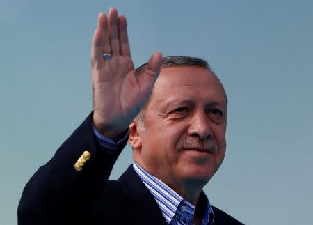 Turkish President Tayyip Erdogan greets his supporters during a ceremony in Istanbul, Turkey, March 26, 2017. REUTERS/Murad Sezer