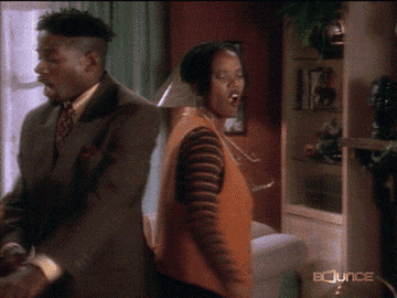 Black friends dancing in an opening scene