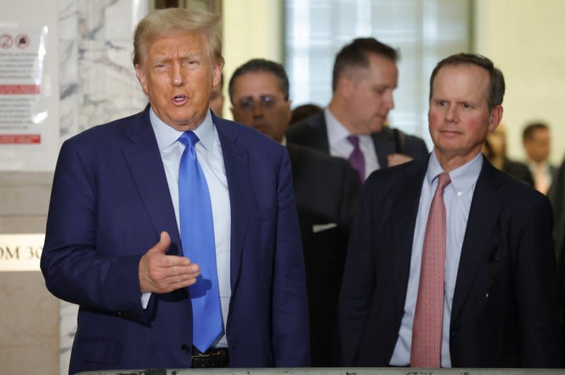 Ex-President Donald Trump (L) speaks during a break in his civil fraud trial at State Supreme Court on Tuesday in New York City. Photo by John Angelillo/UPI