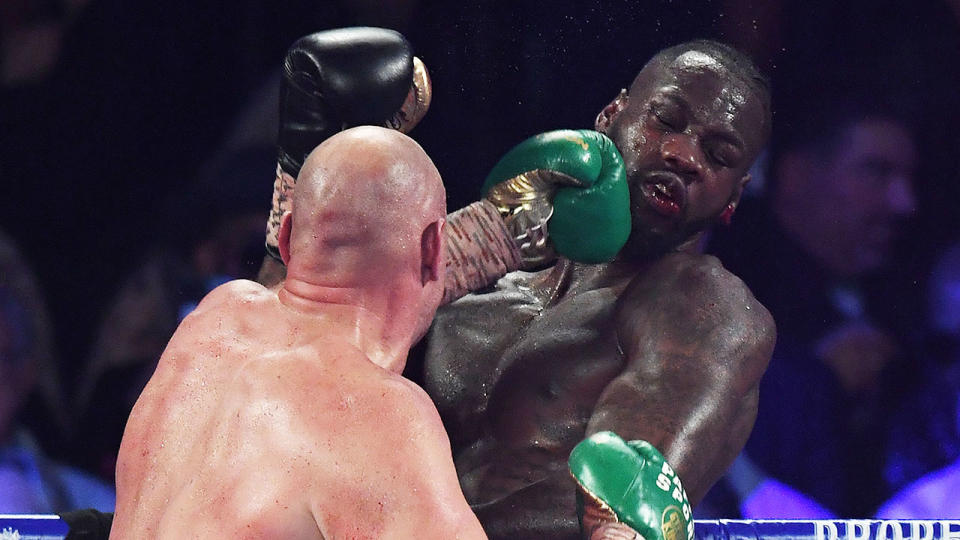 Seen here, Deontay Wilder cops punishment from Tyson Fury before his 7th round defeat.