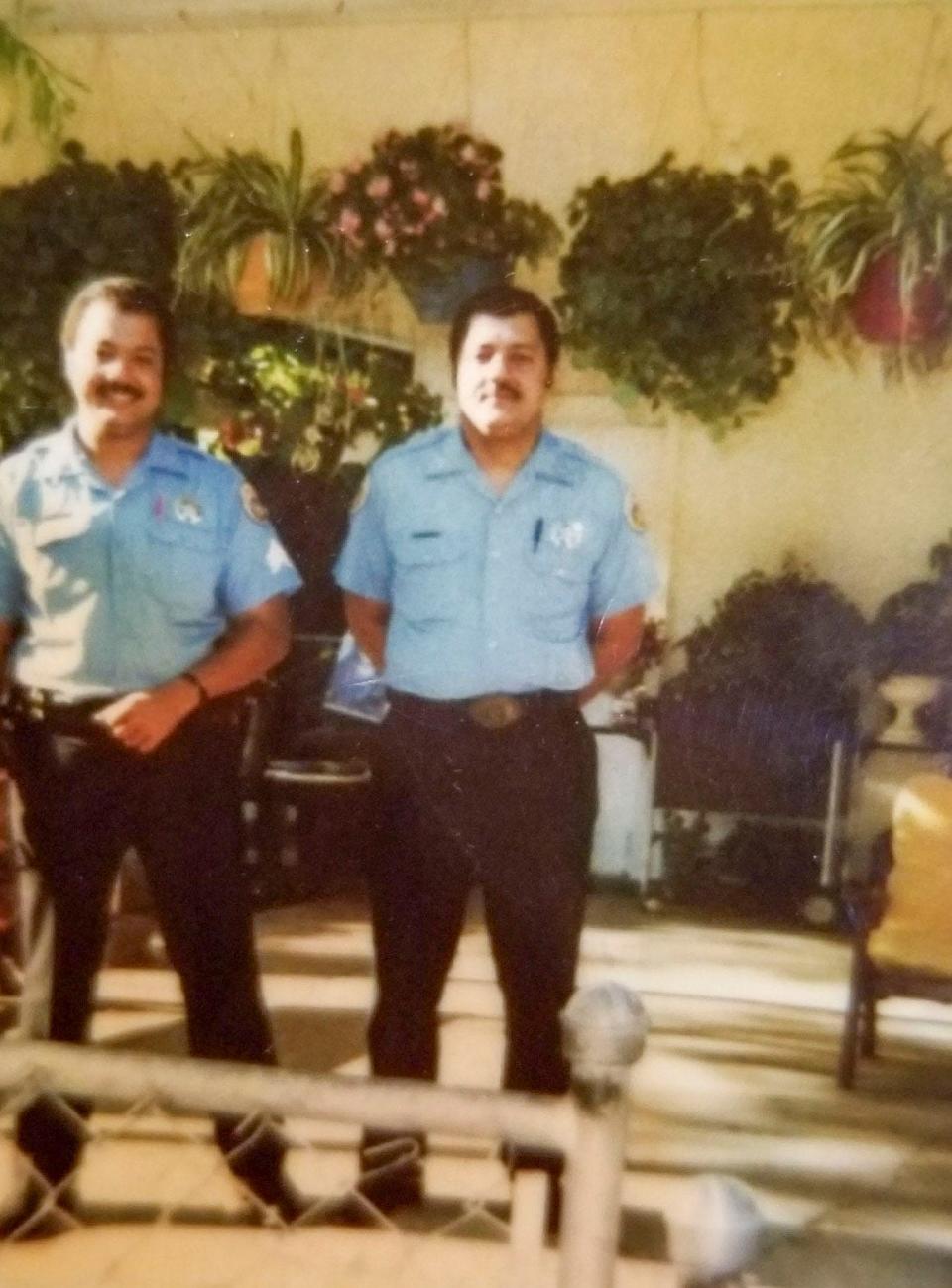 Randolph Tomas (right) with his twin brother Rudolph when they were both New Orleans Police Department officers.