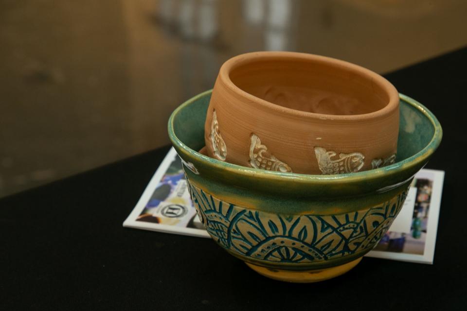 Two one-of-a-kind bowls sit on a table at the 13th Souper Bowl at the Art Center of Corpus Christi Thursday, Feb. 16, 2023.