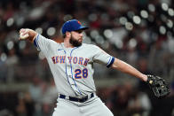 New York Mets first baseman Darin Ruf (28) pitches in relief during the eighth inning of a baseball game against the Atlanta Braves Monday, Aug. 15, 2022, in Atlanta. (AP Photo/John Bazemore)
