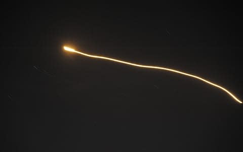 Air defence systems intercept Israeli missiles over Syrian airspace, the Syrian Arab News Agency reports - Credit: AFP