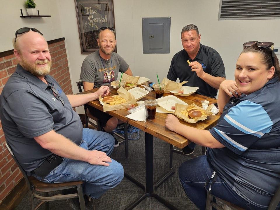 Lucerne Valley Unified School District staff, left to right, Superintendent Peter Livingston, Head Counselor Kevin Barda, Assistant Superintendent Nate Lambdin and Assistant Principal Jessica Haecker, enjoy at meal at the student-led "The Corral” restaurant at Lucerne Valley Middle/High School.