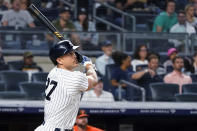 New York Yankees' Giancarlo Stanton watches his three-run home run during the fourth inning of the team's baseball game against the Baltimore Orioles, Tuesday, Aug. 3, 2021, in New York. (AP Photo/Mary Altaffer)