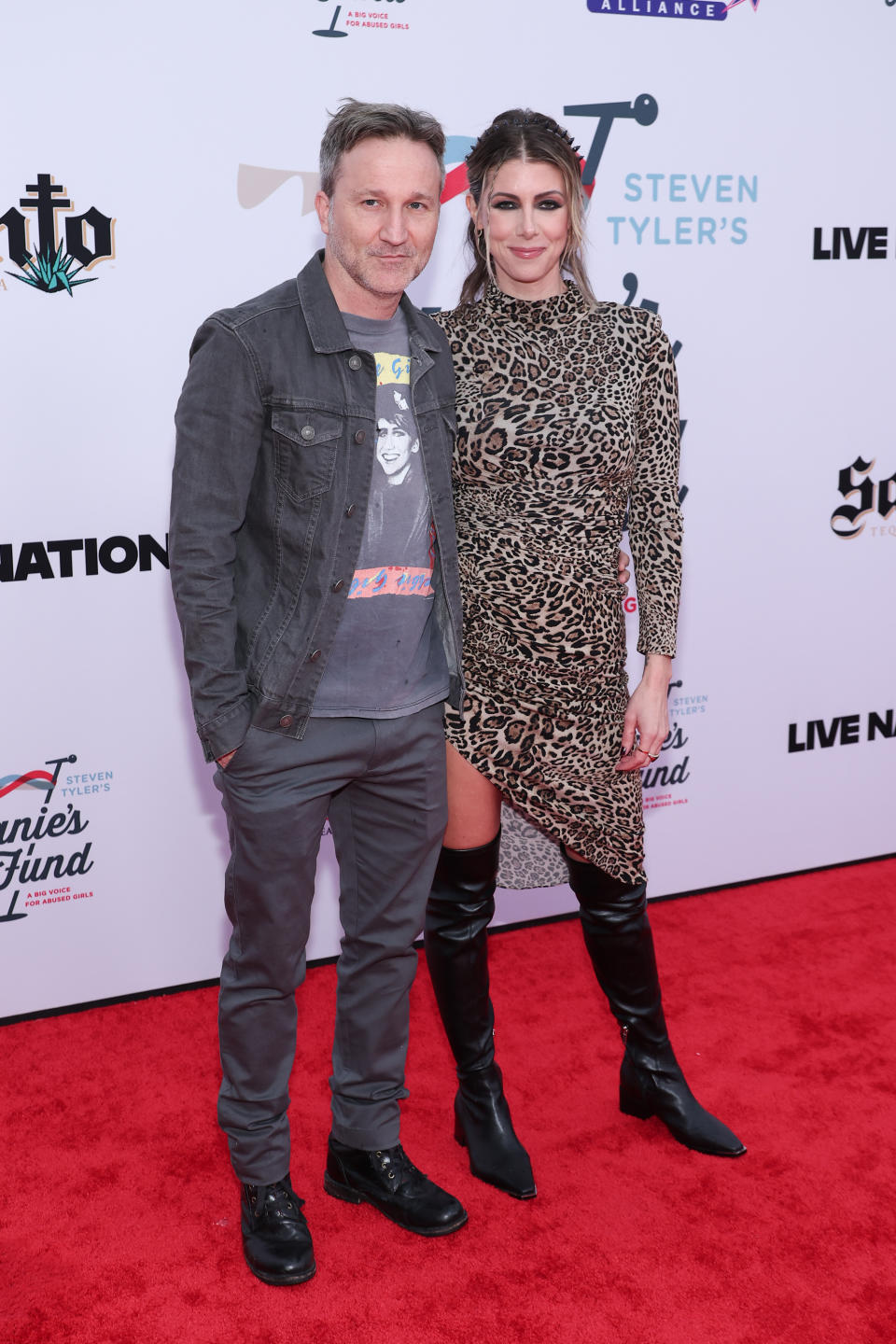 Breckin Meyer and Kelly Rizzo at the 5th Jam for Janie GRAMMY Awards Viewing Party held at the Hollywood Palladium on February 4, 2024 in Los Angeles, California. (Photo by John Salangsang/Billboard via Getty Images)