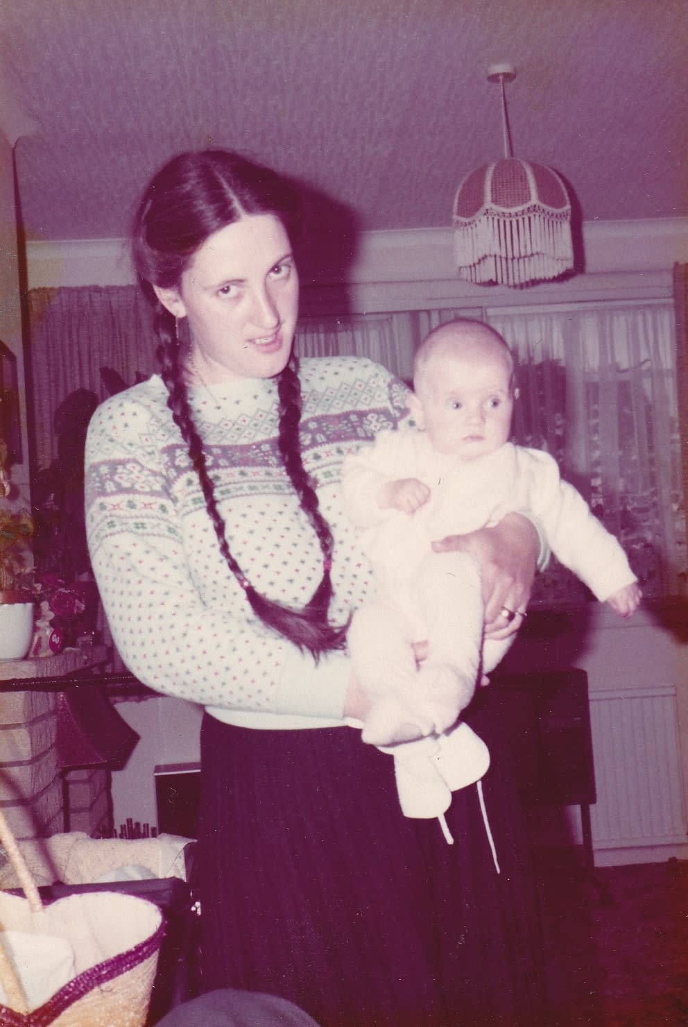 Gemma’s mother Joan holding her daughter aged three months (Joan Collins/PA)