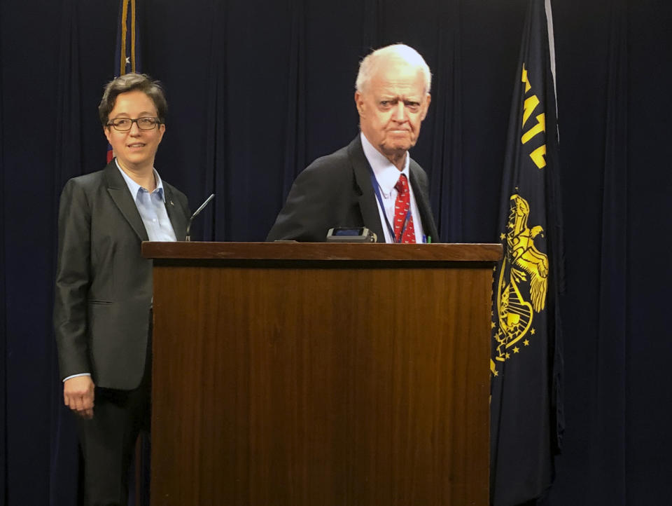 House Speaker Tina Kotek, left, and Senate President Peter Courtney appear before the press on Thursday, March 5, 2020, after Oregon's 2020 legislative session abruptly ended early amid an impasse with minority Republicans over a climate change bill and their tactic of walking out to deny a quorum and prevent the Senate and House from voting on bills. (AP Photo/Andrew Selsky)