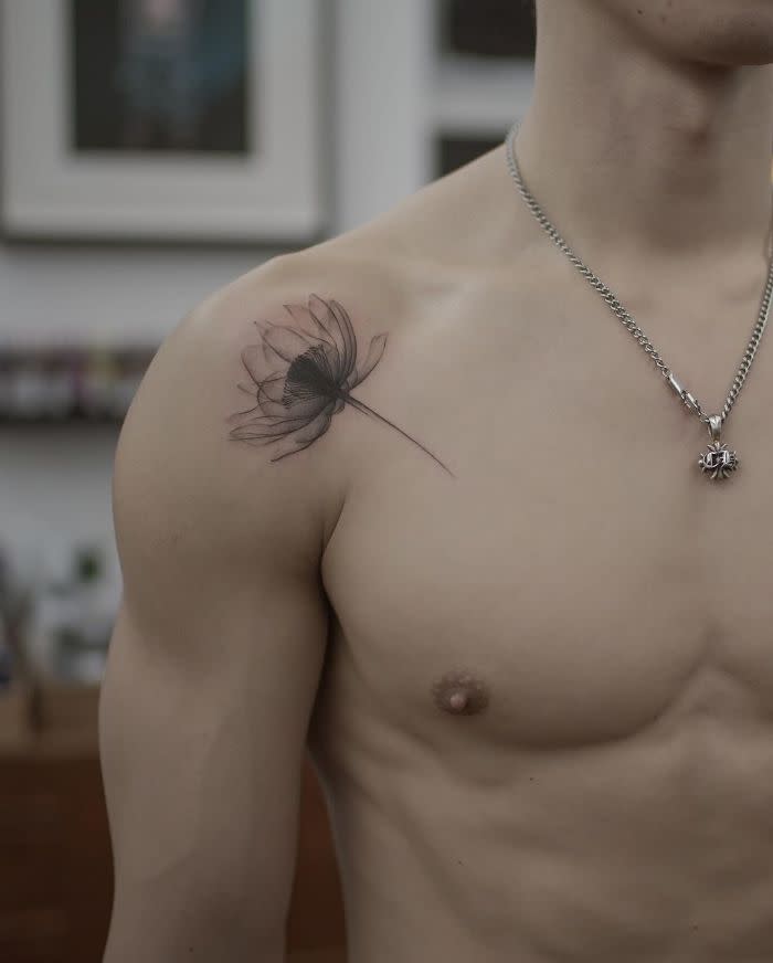 Stanley's lotus tattoo is in remembrance of his mother