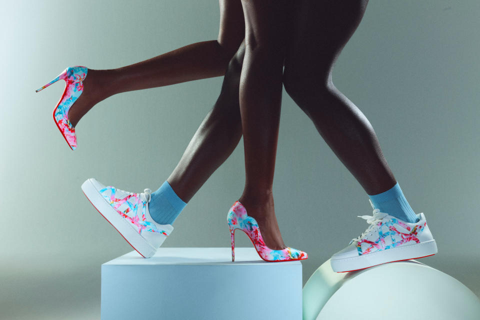 Christian Louboutin’s “Walk a Mile in My Shoes Season II” capsule with Idris and Sabrina Elba, the second iteration of the trio’s charity-focused collaboration. Shown here, the “Hot Chick” pump and “2022SL” sneakers done in a Celebration custom print dedicated to the couple’s African heritage. - Credit: Courtesy of Christian Louboutin