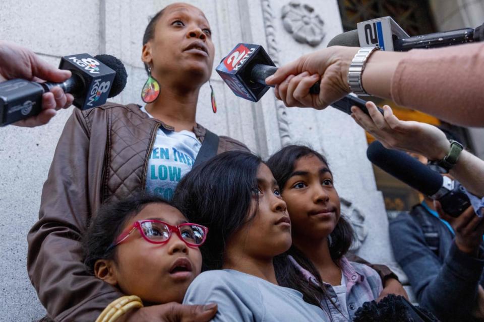<div class="inline-image__title">1202363783</div> <div class="inline-image__caption"><p>Demetria Hester speaks to the media while holding her daughters outside the courthouse after Jeremy Christian was found guilty of first-degree murder on February 21, 2020 in Portland, Oregon.</p></div> <div class="inline-image__credit">Photo by JOHN RUDOFF/AFP via Getty Images</div>