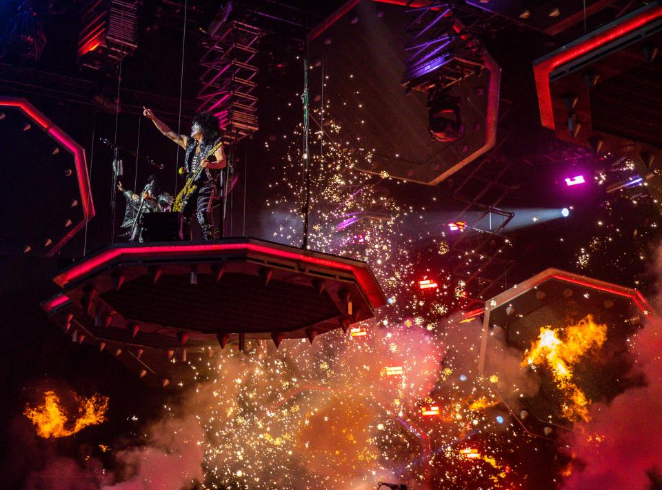 KISS guitarist Paul Stanley arrives alongside bassist Gene Simmons from the rafters during their show at Acrisure Arena in Palm Desert, Calif., Wednesday, Nov. 1, 2023.