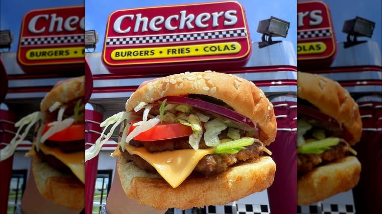 Checkers location with burger in foreground