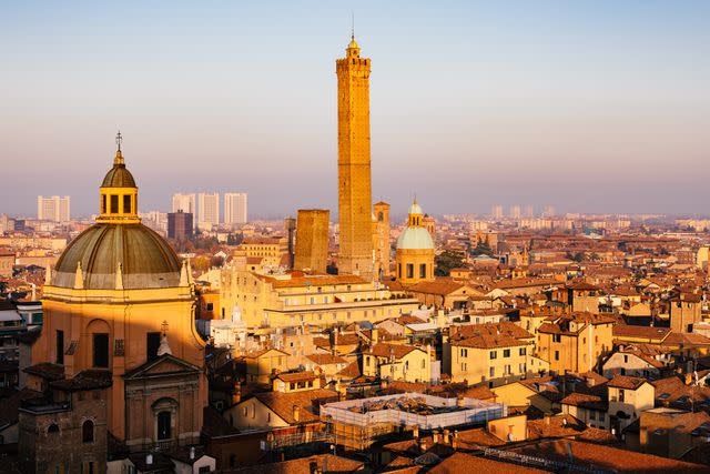 <p>Getty</p> The historic towers stand tall in the skyline of Bologna.