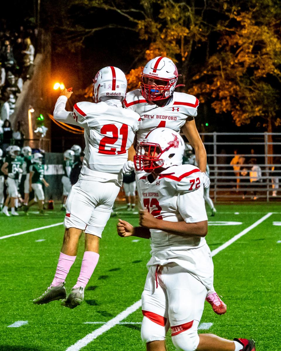 New Bedford celebrate a big defensive stop.