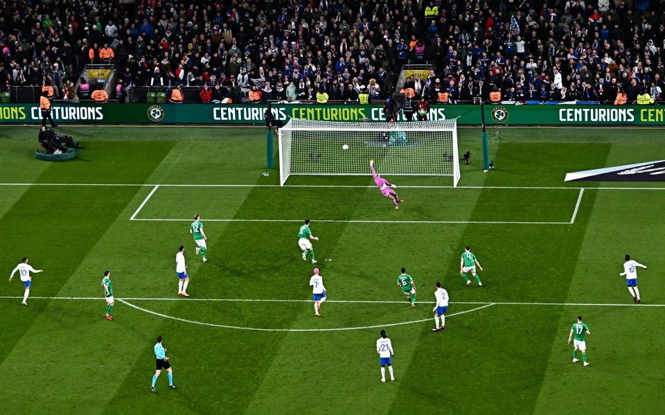Republic of Ireland goalkeeper Gavin Bazunu fails to stop a cracking shot from Benjamin Pavard of France - Ramsey Cardy/Sportsfile via Getty Images