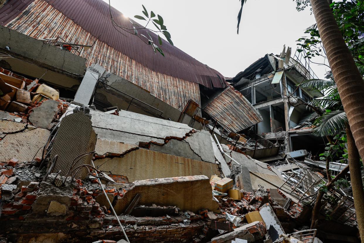 The wreckage of a printing company factory that collapsed in New Taipei.