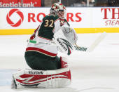 TORONTO, CANADA - JANUARY 19: Niklas Backstrom #32 of the Minnesota Wild takes a shot off the mask in a game against the Toronto Maple Leafs on January 19, 2012 at the Air Canada Centre in Toronto, Ontario, Canada. (Photo by Claus Andersen/Getty Images)