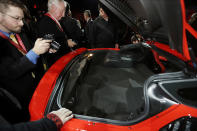 The rear trunk hood is opened to highlight the trunk space of the new Corvette Stingray.