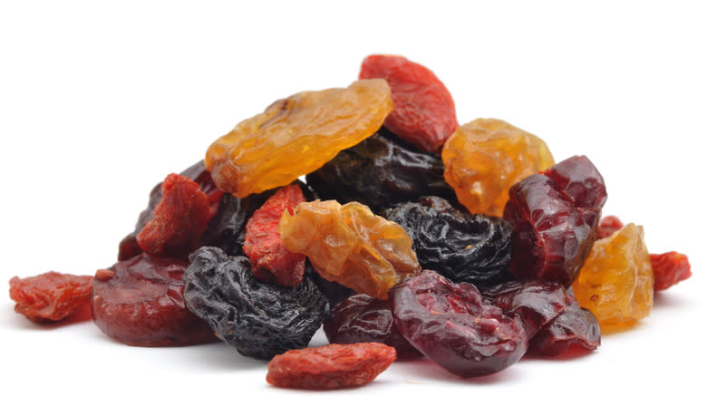 Pile of dried fruit on white background 