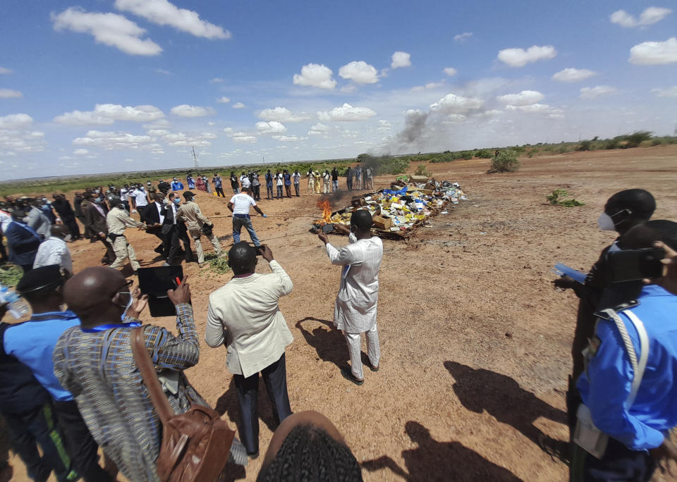 In this photo released by The United Nations Office on Drugs and Crime, shows officials burning seized drugs in Niamey, Niger, Monday, June 26, 2023. Drug seizures soared in the West African Sahel region according to figures released Friday April 19, 2024 in a new U.N. report, indicating the conflict-ridden region is becoming an influential route for drug trafficking. In 2022, 1,466 kilograms, [3,232 pounds], of cocaine were seized in Mali, Chad, Burkina Faso and Niger compared to an average of 13 kilograms [28.7 pounds] between 2013 and 2020 , said the report from the U.N. Office on Drugs and Crime. (UNODC via AP)