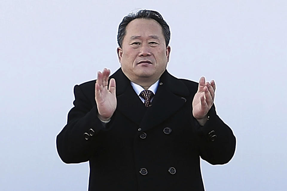 FILE - In this Dec. 26, 2018, file photo, North Korean Ri Son Gwon, center, chairman of the North Korean agency that handles inter-Korean affairs, applauses with South Korean officials during a groundbreaking ceremony at Panmun Station in Kaesong, North Korea. Ri on Wednesday, June 23, 2021, reiterated the North Korea's stance that it has no immediate intention to resume stalled nuclear talks with the United States, dismissing hopes expressed by U.S. and South Korean officials for a quick resumption of negotiations. (Korea Pool/Newsis via AP)