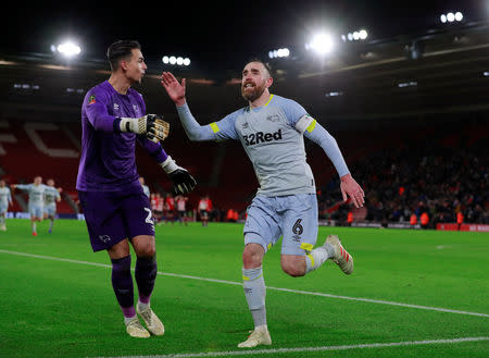 Soccer Football - FA Cup Third Round Replay - Southampton v Derby County - St Mary's Stadium, Southampton, Britain - January 16, 2019 Derby County's Richard Keogh celebrates scoring a penalty during a penalty shootout with Kelle Roos Action Images via Reuters/Andrew Couldridge