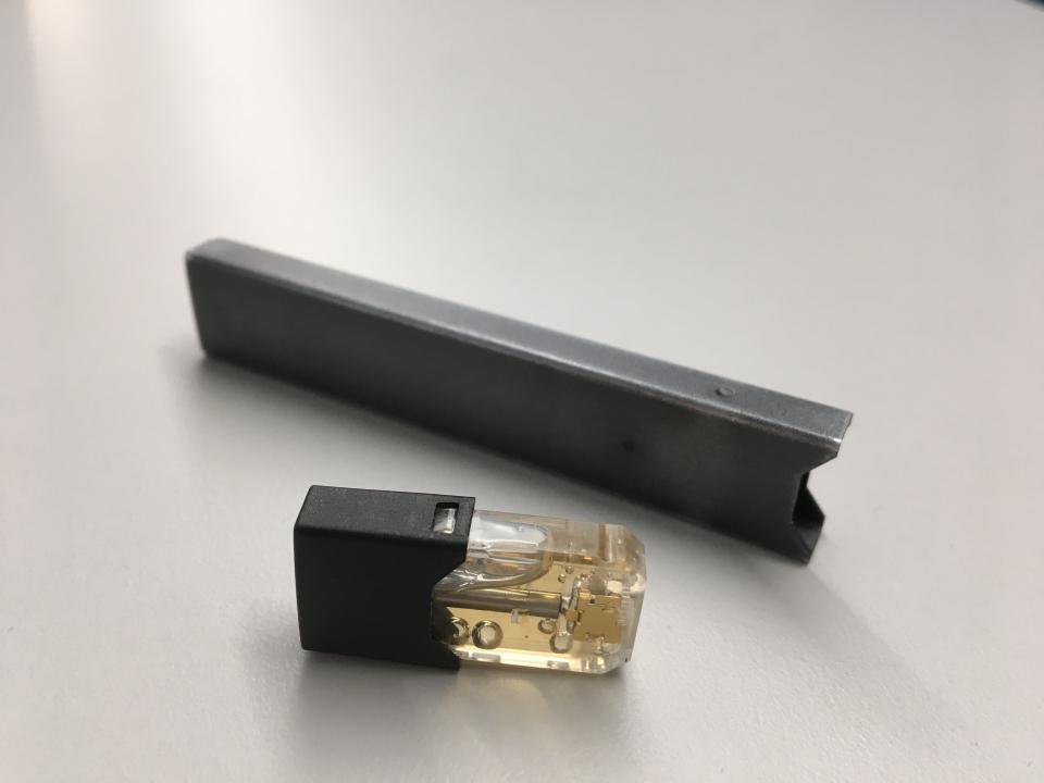 This is a Juul electronic cigarette with the e-liquid/nicotine cartridge removed.