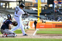 Detroit Tigers designated hitter Miguel Cabrera hits a single against the Minnesota Twins during the first inning of a baseball game, Sunday, Oct. 2, 2022, in Detroit. (AP Photo/Jose Juarez)
