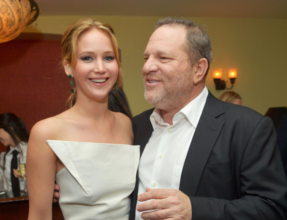 Jennifer Lawrence and Harvey Weinstein at a 2013 screening of <em>Silver Linings Playbook</em>. (Photo: Charley Gallay/Getty Images for VF)