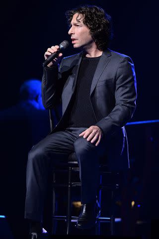 <p>Dave J Hogan/Getty </p> Jason Gould performing in 2013