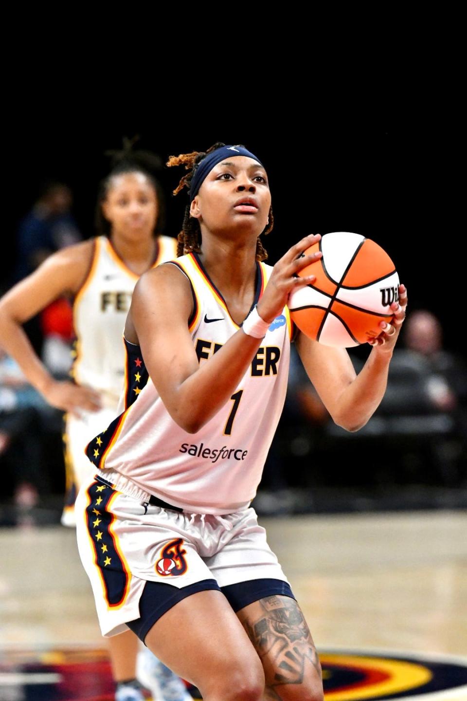 Indiana's NaLyssa Smith shoots a free throw as the Indiana Fever host the Chicago Sky in a preseason game at Gainbridge Fieldhouse in Indianapolis on April 30, 2022.