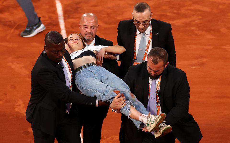 Casper Ruud survives interruption by protester to book place in French Open final against Rafael Nadal - GETTY IMAGES
