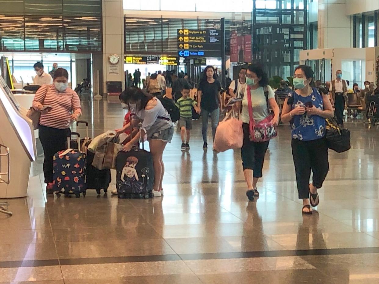 Travellers in face masks at Jewel Changi Airport, amid the global Wuhan coronavirus outbreak in January 2020. PHOTO: Dhany Osman/Yahoo News Singapore