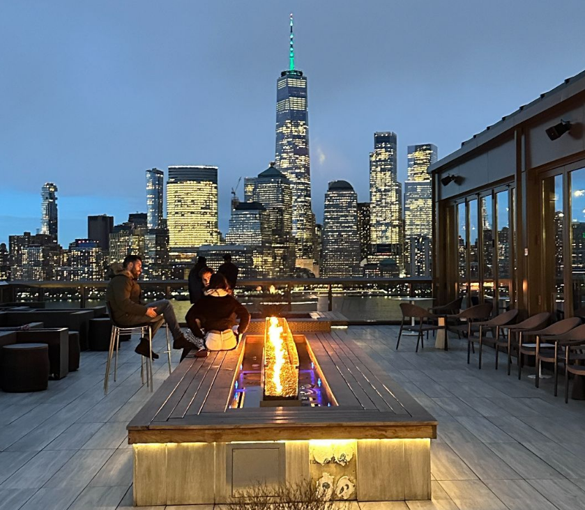 Night begins to fall at RoofTop at Exchange Place.