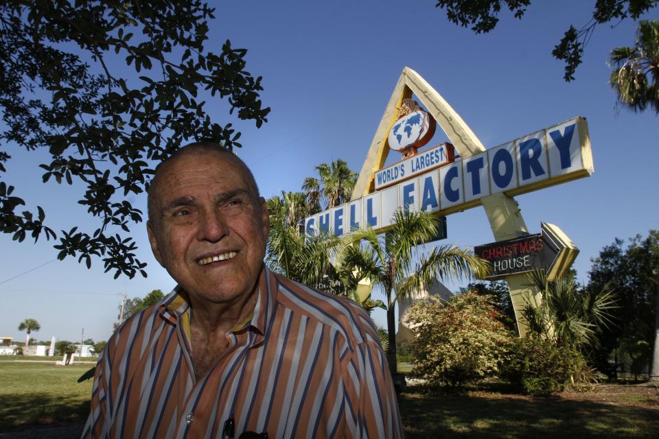 Shell Factory & Nature Park owner Tom Cronin near the iconic sign in North Fort Myers.