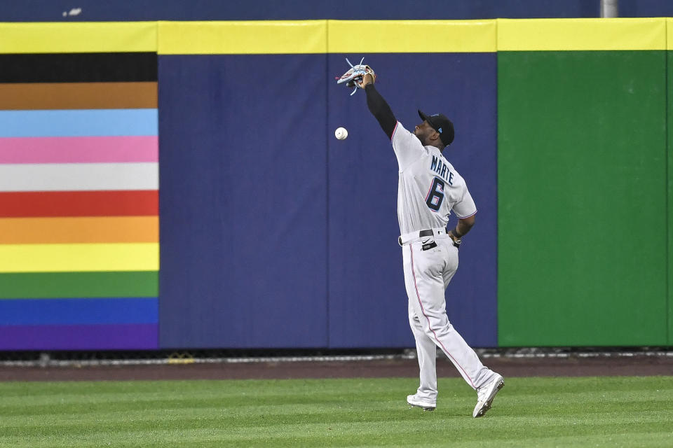 Miami Marlins center fielder Starling Marte drops a sacrifice fly by Toronto Blue Jays' Joe Panik for an error during the ninth inning of a baseball game in Buffalo, N.Y., Wednesday, June 2, 2021. The winning run scored on the play. (AP Photo/Adrian Kraus)