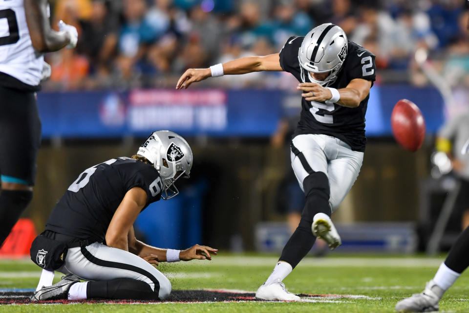 CANTON, OHIO – AUGUST 04: <a class="link " href="https://sports.yahoo.com/nfl/players/31137" data-i13n="sec:content-canvas;subsec:anchor_text;elm:context_link" data-ylk="slk:Daniel Carlson;sec:content-canvas;subsec:anchor_text;elm:context_link;itc:0">Daniel Carlson</a> #2 of the Las Vegas Raiders kicks a 55-yard field goal during the first half of the 2022 Pro Hall of Fame Game against the Jacksonville Jaguars at Tom Benson Hall Of Fame Stadium on August 04, 2022 in Canton, Ohio. (Photo by Nick Cammett/Getty Images) *** Local Caption ** Daniel Carlson