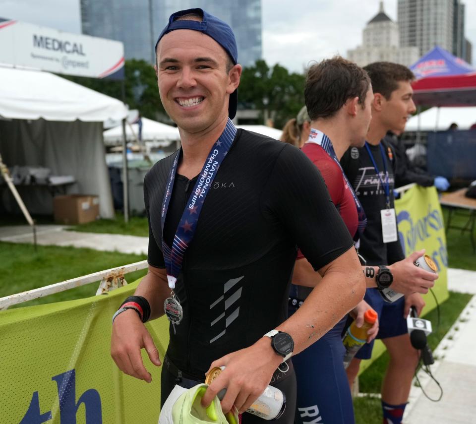 Matt Guenter, from Boulder Colorado, is all smiles after his first-place finish Sunday in the USA Triathlon Age Group National Championships in Milwaukee.